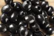 top view image of heap of black olives
