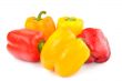 Multi-colored peppers on a white background