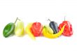 Multi-colored peppers on a white background