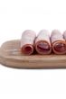 rolls of ham in wooden plate