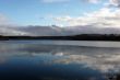 Lake with reflection of the sky in the water.