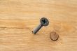 screw driver in wooden plank