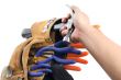 close up shot of a person holding hammer