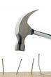 hammer and nail on wood