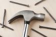 hand hammer and metal nails