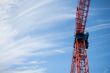 construction crane with blue sky in the background