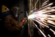 manual worker with metal cutting tool