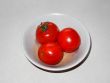 Three red tomatoes