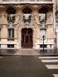 an elaborate door and stone carved building