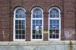 glass window on bricked wall