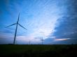 view of wind turbines at dusk