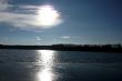 Lake and sky with sun.