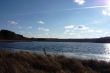 Sky with clouds and a lake.