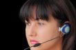 Woman in earphone with blue eyes