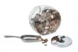 Glass Jar Full of Coins with a Metal Scoop