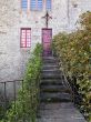 Red Door with Iron Reinforcements