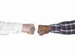two hands making fist bump