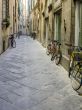 bicycles parked on the street in tuscany