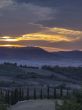 rollingtuscan landscape at dusk