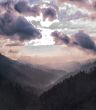 silhouette image of mountains and clouds