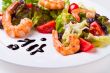 salad with shrimps on a white plate