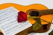 A guitar and a rose.