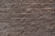 Gray brick wall.