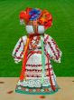 doll with wreath