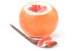 Fresh red grapefruit on white background