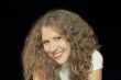 Young woman with long brown nature hair
