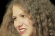 Young woman with long brown nature hair