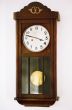 old grandfather's clock with pendulum