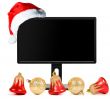 monitor and Santa Claus hat