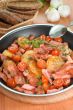 Fried potatoes with meat and vegetables