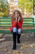 Portrait of woman in red coat