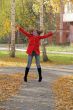 Young woman with autumn leaves
