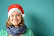 Laughing young Woman with Santa Hat