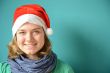 Laughing young Woman with Santa Hat