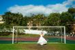 Bride on the football field