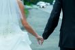 Walk with fingers joined the bride and groom
