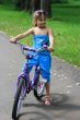 6 years old girl riding a bicycle.