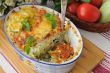 casserole of pasta with zucchini and tomato with cheese