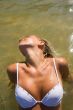 Sexual girl bathes in the sea