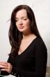 Portrait of the young brunette woman