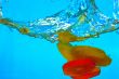 Citrus slice SPLASHING IN WATER 