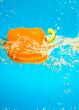 YELLOW PEPPER SPLASHING IN WATER 