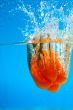 YELLOW PEPPER SPLASHING IN WATER 