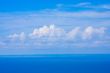 Blue Skies with Clouds over the sea