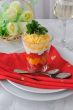Salad of red and yellow tomatoes with mayonnaise and cheese