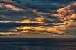 sunset on an overcast sea 